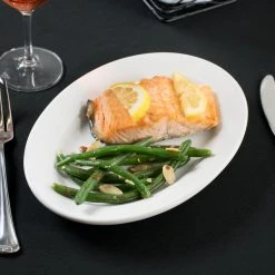 Acopa 10 3/8" X 7 1/8" Bright White Wide Rim Rolled Edge Oval Stoneware Platter - 24/Case