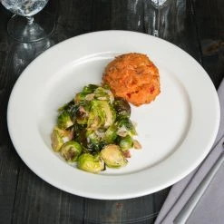 Acopa 11 1/4" Ivory (American White) Wide Rim Rolled Edge Stoneware Plate - 12/Case