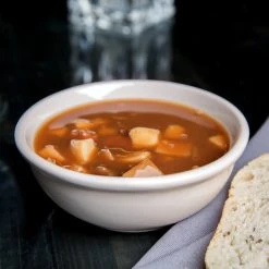 Acopa 10 Oz. Ivory (American White) Rolled Edge Stoneware Nappie Bowl - 36/Case