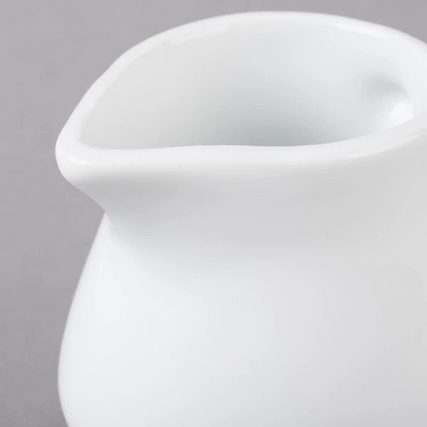 Acopa 3.5 Oz. Bright White Porcelain Creamer - 12/Pack 4 Acopa 3.5 Oz. Bright White Porcelain Creamer - 12/Pack - Image 4