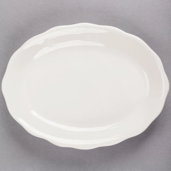 Acopa 9 5/8" X 7 1/8" Ivory (American White) Scalloped Edge Oval Stoneware Platter - 24/Case 2 Acopa 9 5/8" X 7 1/8" Ivory (American White) Scalloped Edge Oval Stoneware Platter - 24/Case - Image 2