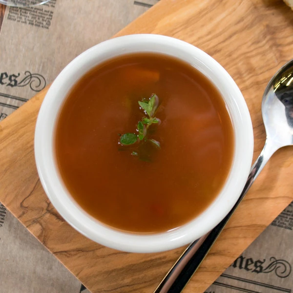 Acopa 7.25 Oz. Ivory (American White) Rolled Edge Stoneware Bouillon Cup - 12/Pack 3 Acopa 7.25 Oz. Ivory (American White) Rolled Edge Stoneware Bouillon Cup - 12/Pack - Image 3