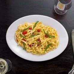 Acopa 13" X 10" Bright White Oval Coupe Stoneware Platter - 12/Case