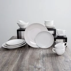 Acopa 9 3/4" X 7 1/2" Bright White Oval Coupe Stoneware Platter - 24/Case 7 Acopa 9 3/4" X 7 1/2" Bright White Oval Coupe Stoneware Platter - 24/Case -Acopa Sales 1571195