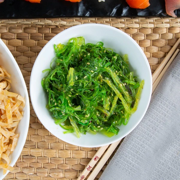 Acopa 8 Oz. Bright White Slanted Porcelain Bowl - 12/Pack 5 Acopa 8 Oz. Bright White Slanted Porcelain Bowl - 12/Pack - Image 5