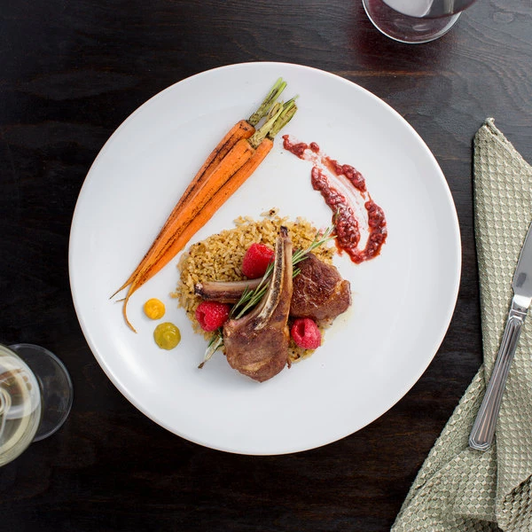 Acopa 11 1/4" Round Bright White Coupe Stoneware Plate - 4/Pack 3 Acopa 11 1/4" Round Bright White Coupe Stoneware Plate - 4/Pack - Image 3