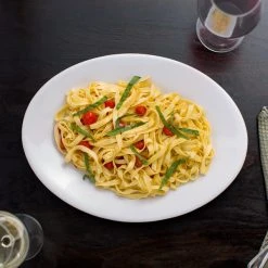 Acopa 13" X 10" Bright White Oval Coupe Stoneware Platter - 4/Pack