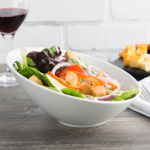 Acopa 20 Oz. Bright White Slanted Porcelain Bowl - 12/Case 1 Acopa 20 Oz. Bright White Slanted Porcelain Bowl - 12/Case