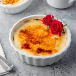 Acopa 8 Oz. Round Bright White Fluted Porcelain Souffle / Creme Brulee Dish - 12/Pack