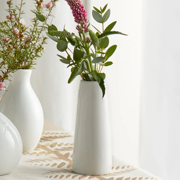Acopa 4" Bright White Porcelain Bud Vase - 12/Case 1 Acopa 4" Bright White Porcelain Bud Vase - 12/Case