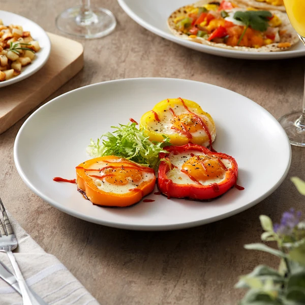 Acopa 10 1/2" Matte White Stoneware Coupe Plate - 12/Case 1 Acopa 10 1/2" Matte White Stoneware Coupe Plate - 12/Case