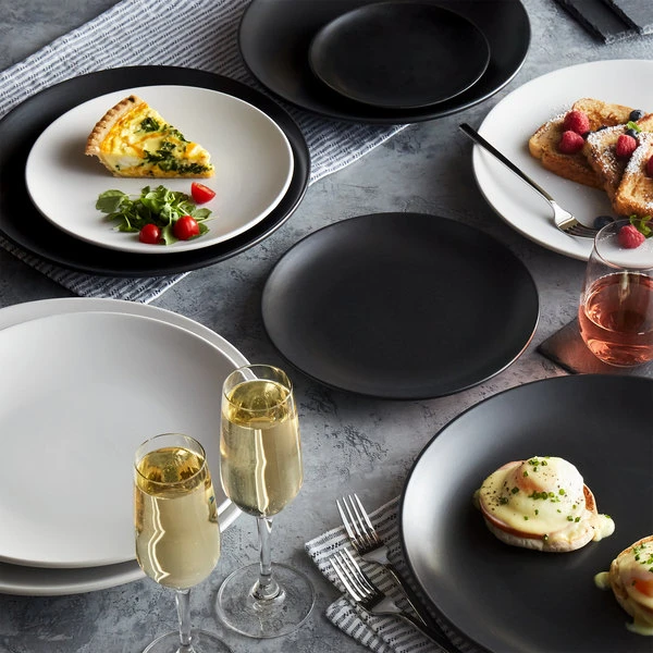 Acopa 10 1/2" Matte Black Stoneware Coupe Plate - 12/Case 4 Acopa 10 1/2" Matte Black Stoneware Coupe Plate - 12/Case - Image 4