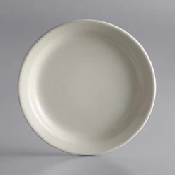 World Tableware NR-6 Kingsmen White 6 1/2" Ultima Cream White Narrow Rim Round Stoneware Plate - 36/Case