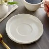 Acopa 6" Ivory (American White) Scalloped Edge Stoneware Saucer - 36/Case