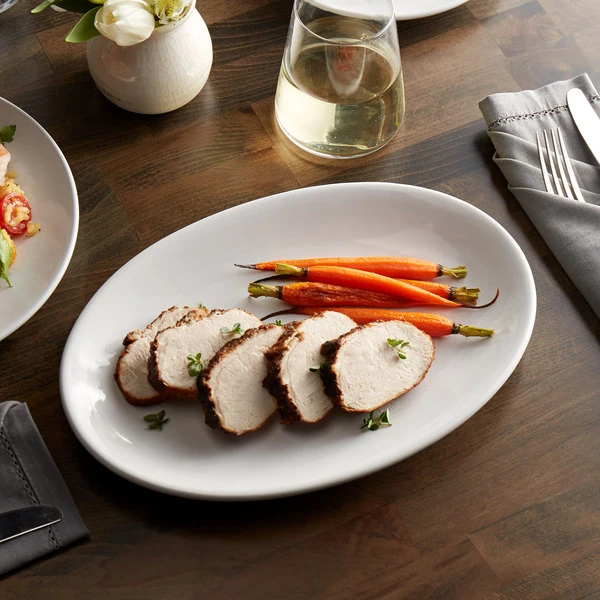 Acopa 11 3/4" X 8" Bright White Oval Coupe Stoneware Platter - 12/Case 1 Acopa 11 3/4" X 8" Bright White Oval Coupe Stoneware Platter - 12/Case