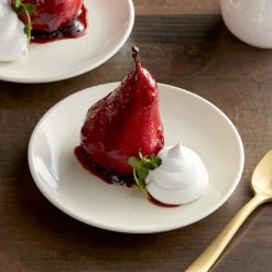 Acopa 6 1/2" Round Ivory (American White) Coupe Stoneware Plate - 36/Case