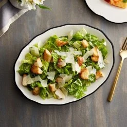 Acopa 11 5/8" X 8 1/2" Ivory (American White) Scalloped Edge Stoneware Platter With Black Band - 12/Case