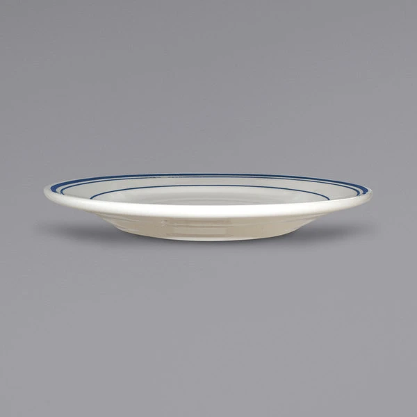 International Tableware CT-9 Catania 9 3/4" Ivory (American White) Stoneware Plate With Blue Bands - 24/Case 2 International Tableware CT-9 Catania 9 3/4" Ivory (American White) Stoneware Plate With Blue Bands - 24/Case - Image 2