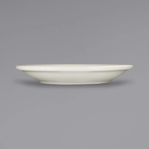 International Tableware RO-36 Roma 5 1/8" Ivory (American White) Wide Rim Rolled Edge Saucer - 36/Case 2 International Tableware RO-36 Roma 5 1/8" Ivory (American White) Wide Rim Rolled Edge Saucer - 36/Case - Image 2