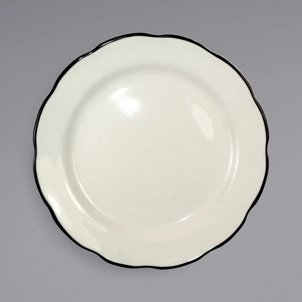International Tableware SY-16 Sydney 10 3/4" Ivory (American White) Scalloped Edge Stoneware Plate With Black Rim - 12/Case 1 International Tableware SY-16 Sydney 10 3/4" Ivory (American White) Scalloped Edge Stoneware Plate With Black Rim - 12/Case