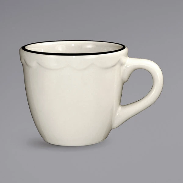 International Tableware SY-35 Sydney 3 Oz. Ivory (American White) Scalloped Edge Stoneware Espresso Cup With Black Rim - 36/Case 1 International Tableware SY-35 Sydney 3 Oz. Ivory (American White) Scalloped Edge Stoneware Espresso Cup With Black Rim - 36/Case