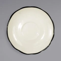 International Tableware SY-36 Sydney 4 7/8" Ivory (American White) Scalloped Edge Stoneware Saucer With Black Rim - 36/Case