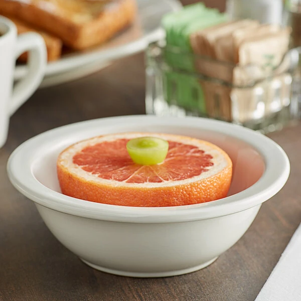 Acopa 6 1/2" Ivory (American White) Rolled Edge Stoneware Grapefruit Bowl - 36/Case 1 Acopa 6 1/2" Ivory (American White) Rolled Edge Stoneware Grapefruit Bowl - 36/Case