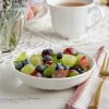 Acopa Condesa 5.5 Oz. Pearl White Scalloped Porcelain Fruit Dish - 36/Case