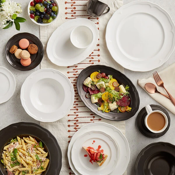Acopa Condesa 9 3/4" X 7" Pearl White Scalloped Wide Rim Porcelain Platter - 24/Case 5 Acopa Condesa 9 3/4" X 7" Pearl White Scalloped Wide Rim Porcelain Platter - 24/Case - Image 5