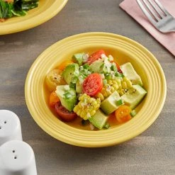 Acopa Capri 6 1/8" Citrus Yellow Stoneware Plate - 12/Pack