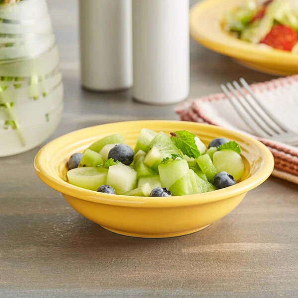 Acopa Capri 4.5 Oz. Citrus Yellow Stoneware Fruit Bowl / Monkey Dish - 12/Pack 1 Acopa Capri 4.5 Oz. Citrus Yellow Stoneware Fruit Bowl / Monkey Dish - 12/Pack