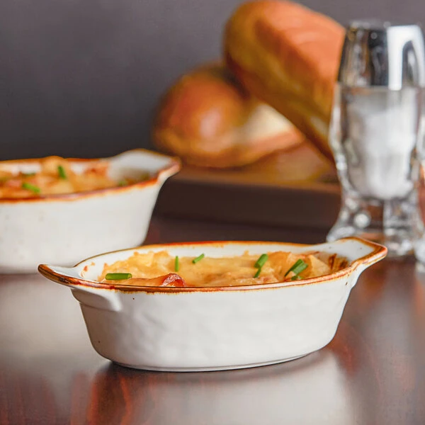 Acopa Keystone 4 Oz. Vanilla Bean Stoneware Mini Rarebit Dish - 6/Case 1 Acopa Keystone 4 Oz. Vanilla Bean Stoneware Mini Rarebit Dish - 6/Case