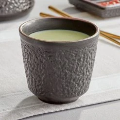 Acopa Heika 12 Oz. Black Matte Textured Stoneware Mug - 12/Case