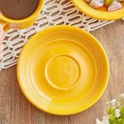 Acopa Capri 6" Mango Orange Stoneware Saucer - 12/Pack