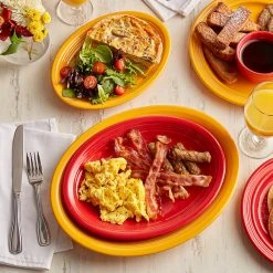 Acopa Capri 13 3/4" X 10 1/2" Mango Orange Oval Stoneware Coupe Platter - 12/Case 9 Acopa Capri 13 3/4" X 10 1/2" Mango Orange Oval Stoneware Coupe Platter - 12/Case -Acopa Sales 2223707