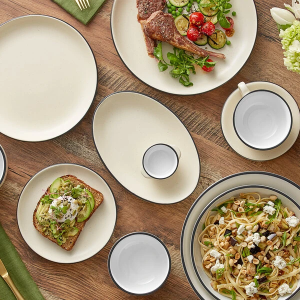 Acopa Embers 10 3/4" Cream White Matte Coupe Stoneware Plate - 12/Case 4 Acopa Embers 10 3/4" Cream White Matte Coupe Stoneware Plate - 12/Case - Image 4