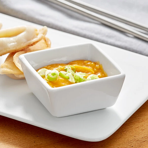 Acopa 4 Oz. Square Bright White Porcelain Sauce Cup - 36/Case 1 Acopa 4 Oz. Square Bright White Porcelain Sauce Cup - 36/Case