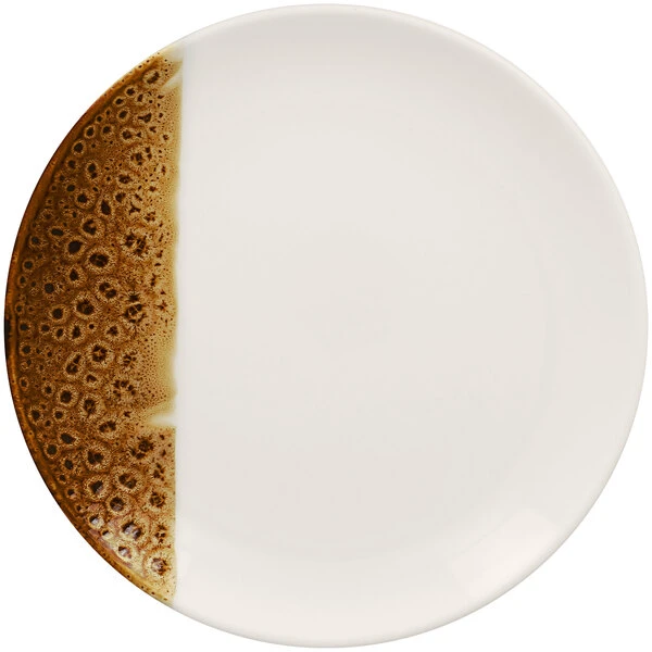 RAK Porcelain Wild 9 7/16" Brown Round Porcelain Flat Coupe Plate - 12/Case 1 RAK Porcelain Wild 9 7/16" Brown Round Porcelain Flat Coupe Plate - 12/Case