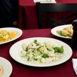 Acopa 12" Ivory (American White) Wide Rim Rolled Edge Stoneware Plate - 12/Case