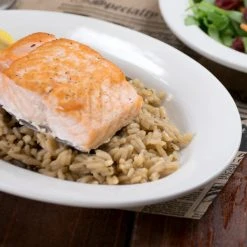 Acopa 9 3/8" X 6 1/2" Ivory (American White) Wide Rim Rolled Edge Oval Stoneware Platter - 24/Case 7 Acopa 9 3/8" X 6 1/2" Ivory (American White) Wide Rim Rolled Edge Oval Stoneware Platter - 24/Case -Acopa Sales 982341